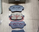 Má phanh trước sau Nissan Micra 2009 chính hãng