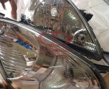 Đèn pha Toyota Innova 2009 chính hãng